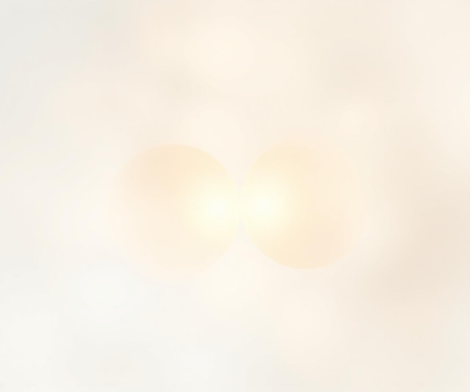 Two glowing orbs connecting, symbolizing empathy